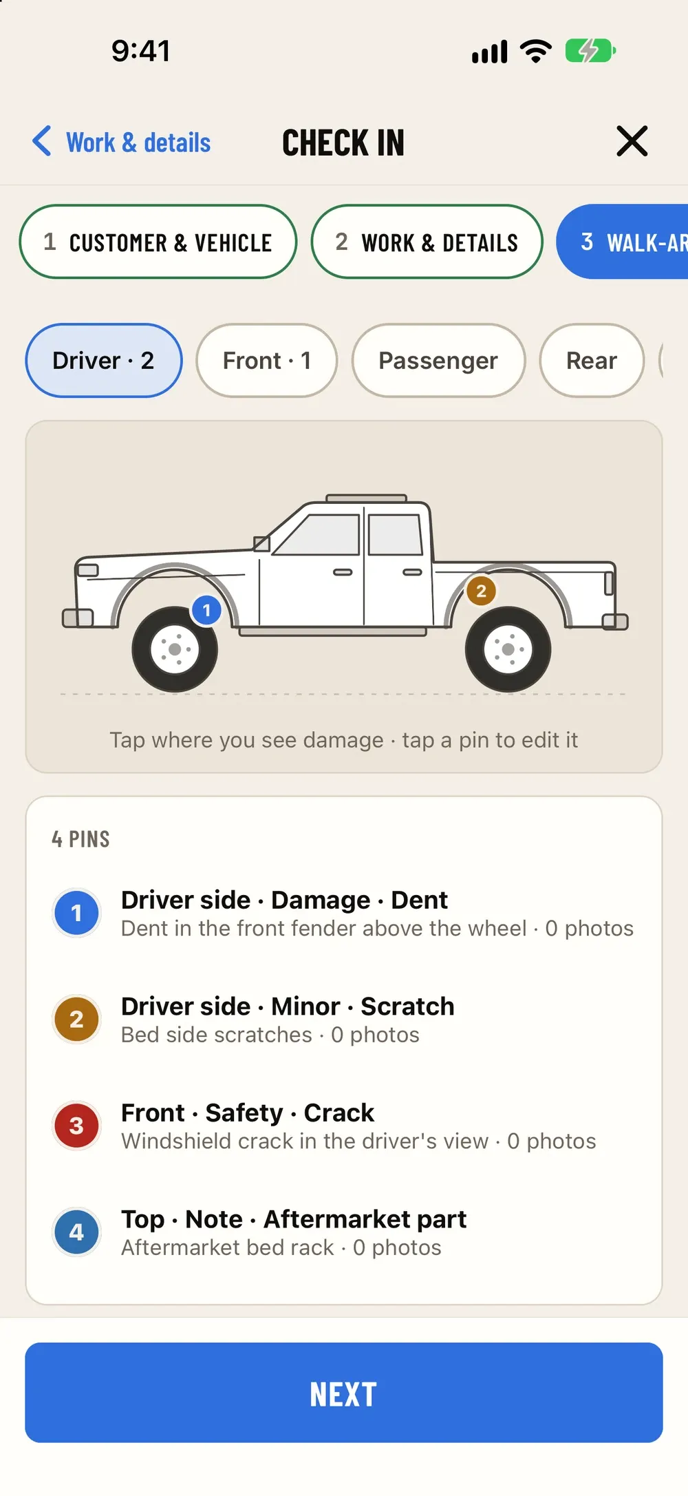 Check-in on iPhone: The walk-around on the phone: pins for damage on each side of the vehicle.
