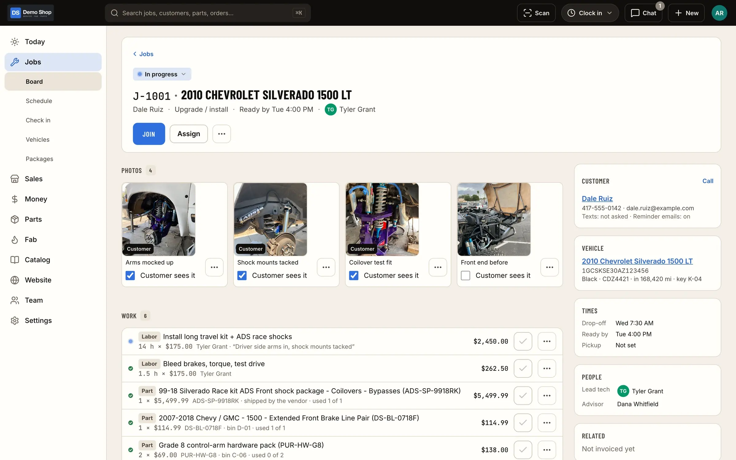 Job detail: Photos, labor and parts lines, customer and vehicle, times and people on one job page.